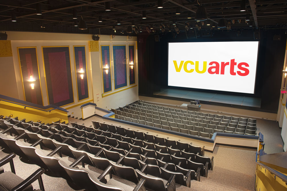 auditorium with V C U arts logo projected onto screen