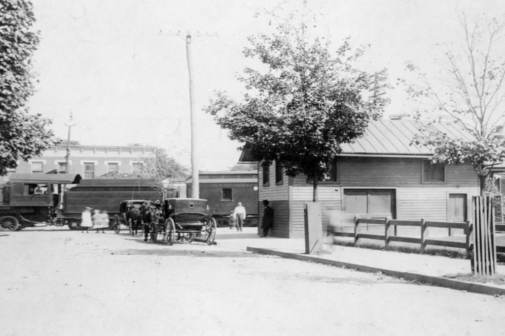 Photo: antique photo of the old Elba train station on broad and belvidere with a horse and buggy