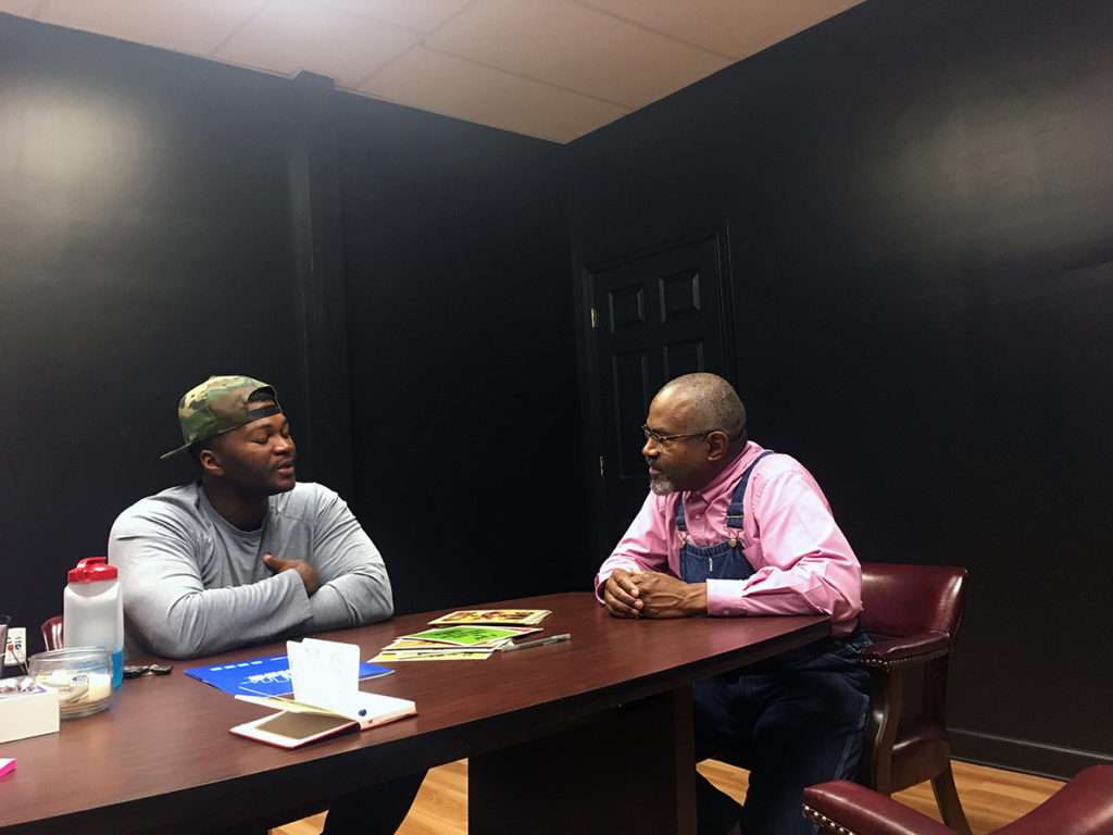 Amos Paul Kennedy visits Barber Shops in Richmond