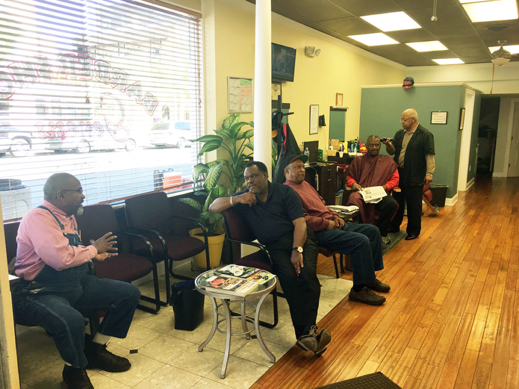 Amos Paul Kennedy visits barber shops in Richmond