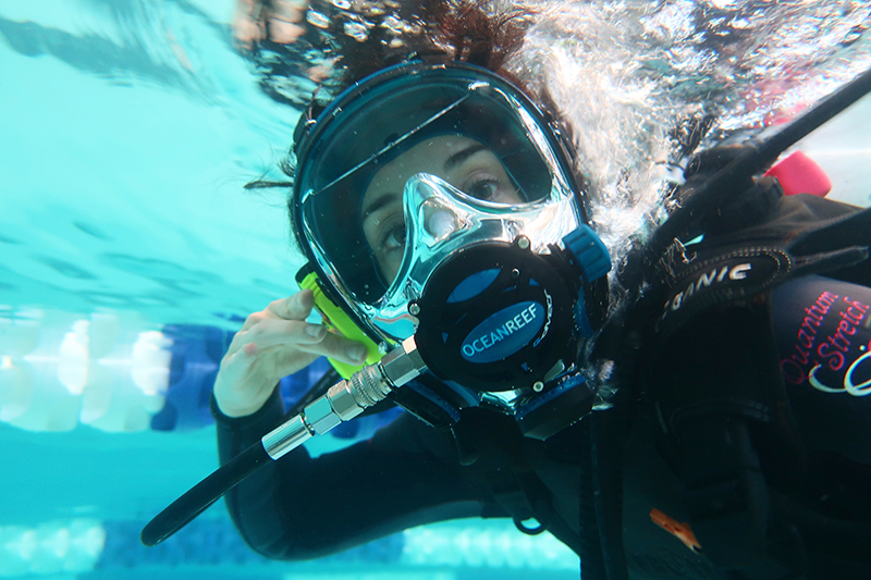 Underwater shot of artist Hope Ginsburg