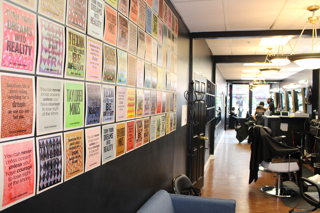 Taylor's Barbershop Interior with Amos Paul Kennedy Prints