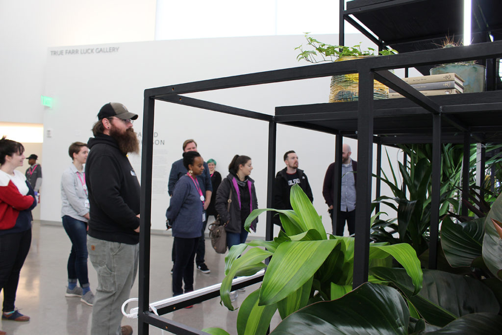 Photo: Tour group explores Rashid Johnson's "Monument" exhibition.