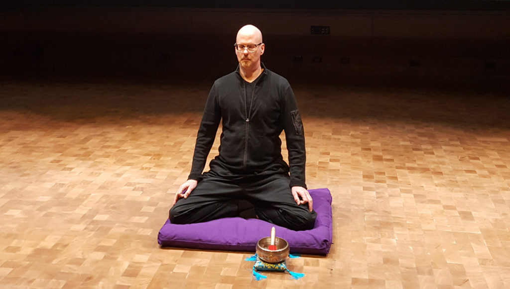 Mindfulness instructor Kirk Warren Brown leads a course in meditation