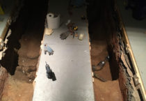 Trenches dug under the home of artist Corin Hewitt