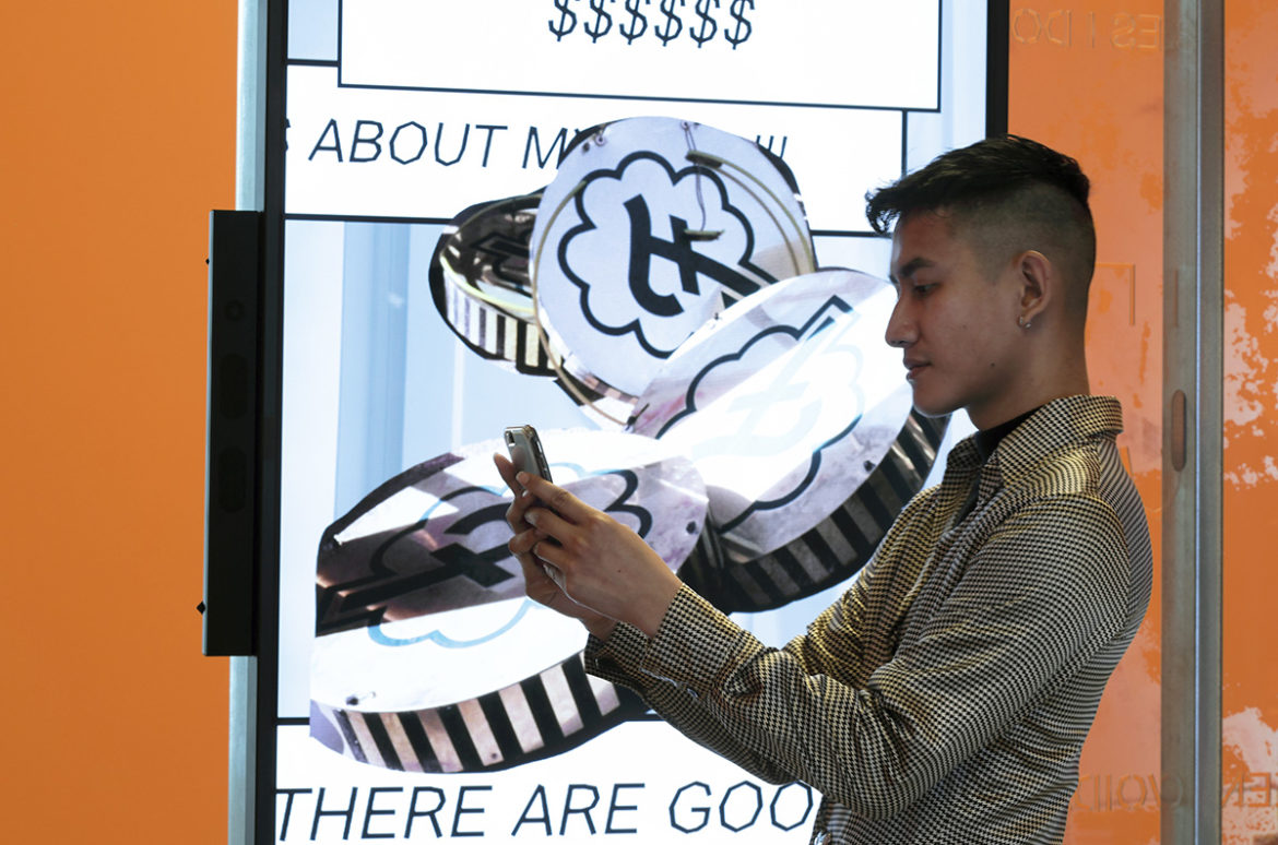 Visitor interacts with the chatbot in Martine Syms' "Shame Space" installation